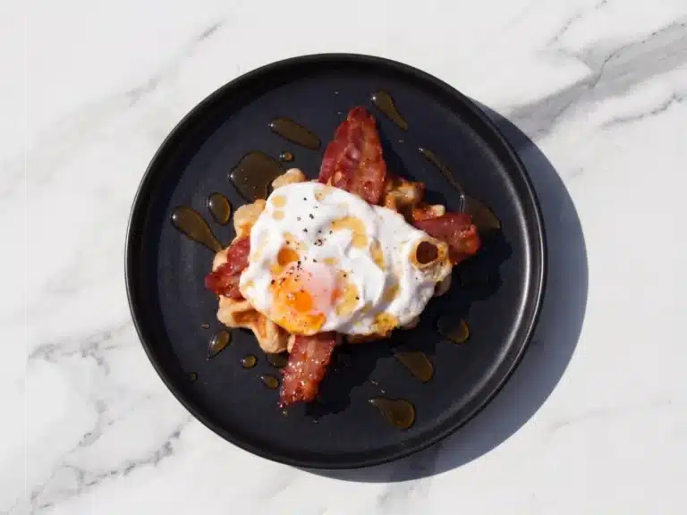 Waffles served with streaky bacon, fried egg & golden syrup